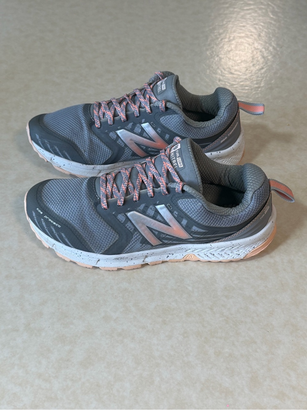 New Balance Women's Gray with Pink Accent Athletic Sneakers